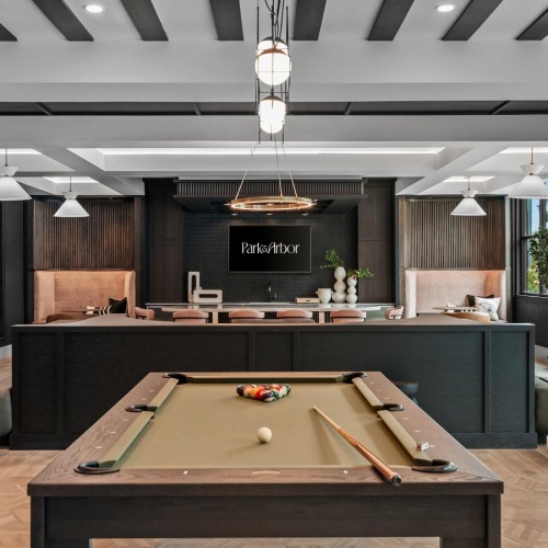 a large room with a large table and chairs